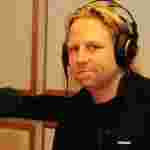 FORNØYD 2: Bård Jortveit, driftssjef på Idda Arena, i Sørnetts radiostudio. (Foto: Kjetil Nygaard)